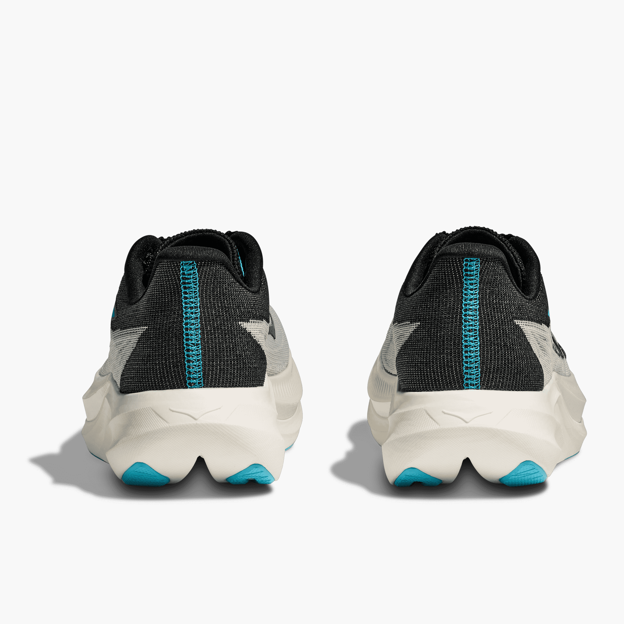Heel angle shot of All Gender Rocket X 3 in White  /  Black