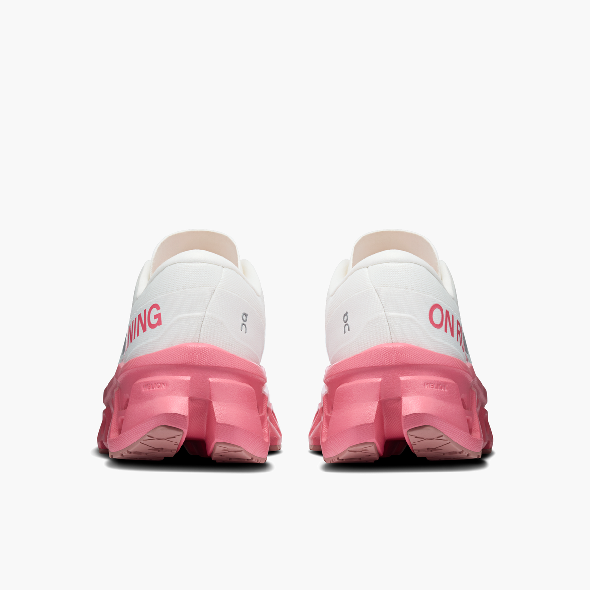 Heel angle shot of Women's Cloudmonster 3 in Ivory | Camellia