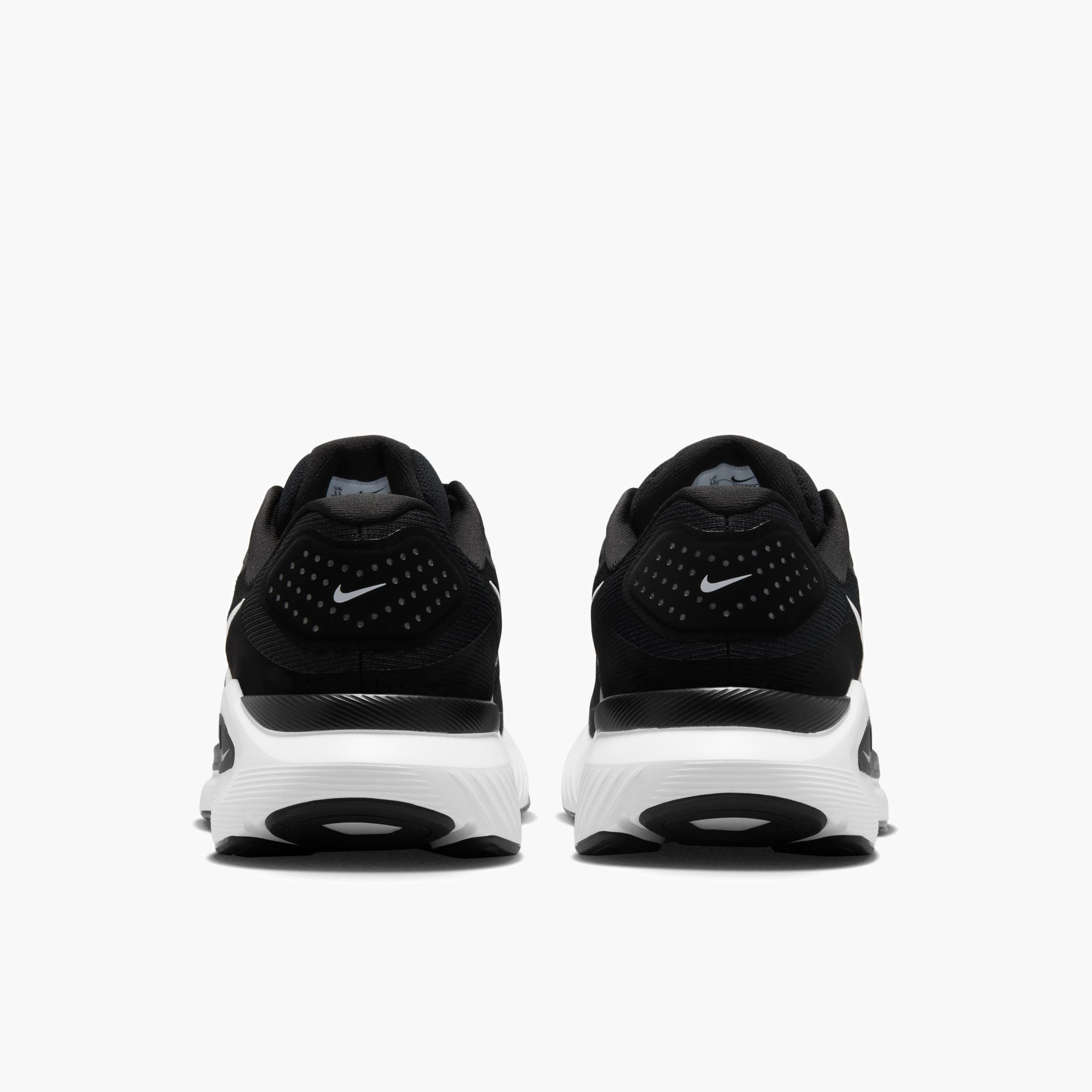 Heel angle shot of Men's Structure 26 in Black / White-Cool Grey-Metallic Silver