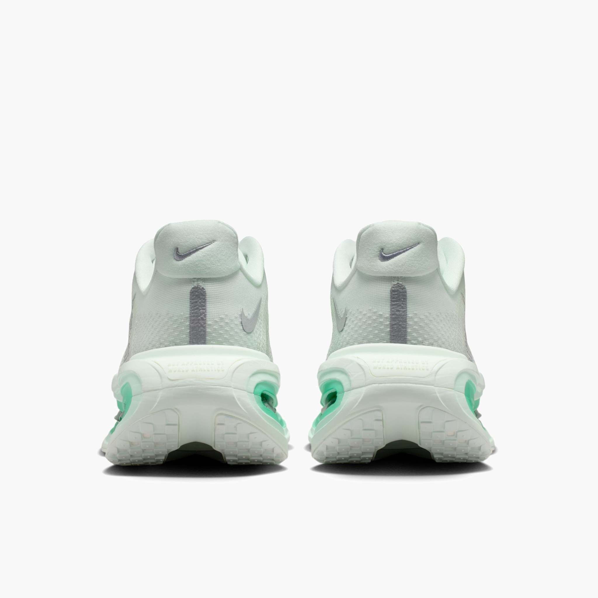 Heel angle shot of Women's Vomero Premium in Barely Green / Metallic Silver