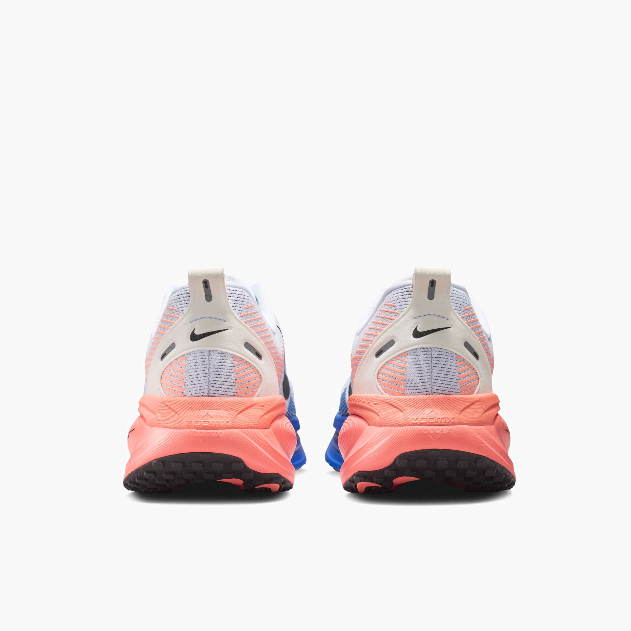 Heel angle shot of Men's Vomero 18 in White / Black-Racer Blue-Atomic Pink