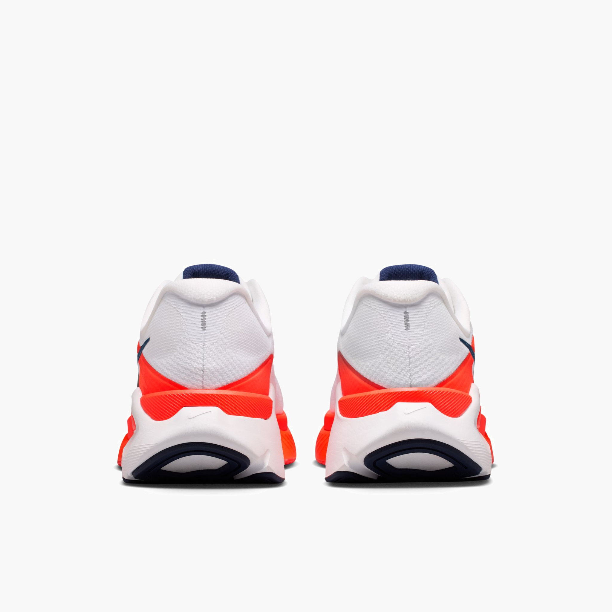 Heel angle shot of Men's Structure Plus in White / Midnight Navy-Bright Crimson