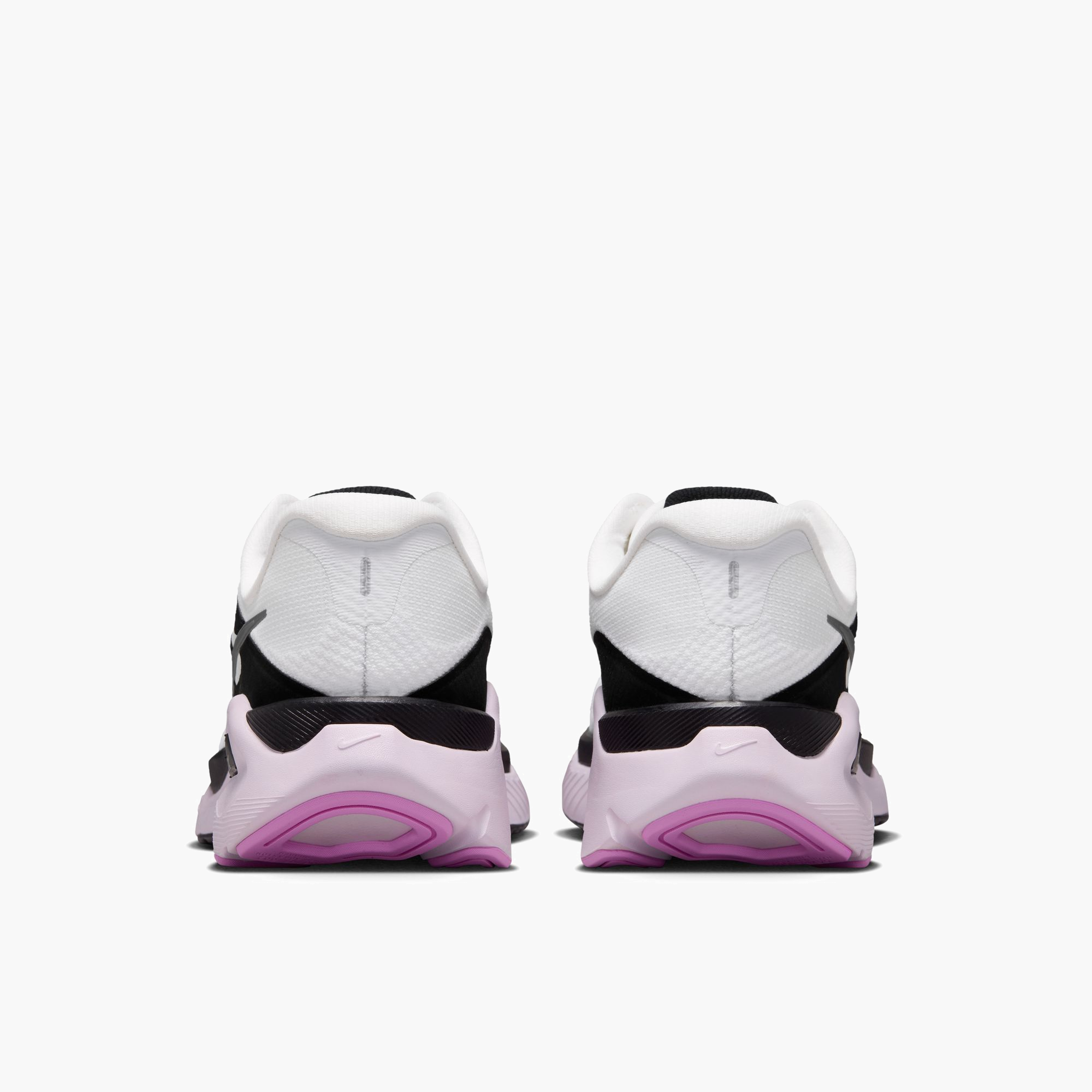 Heel angle shot of Women's Structure Plus in White / Metallic Silver-Black