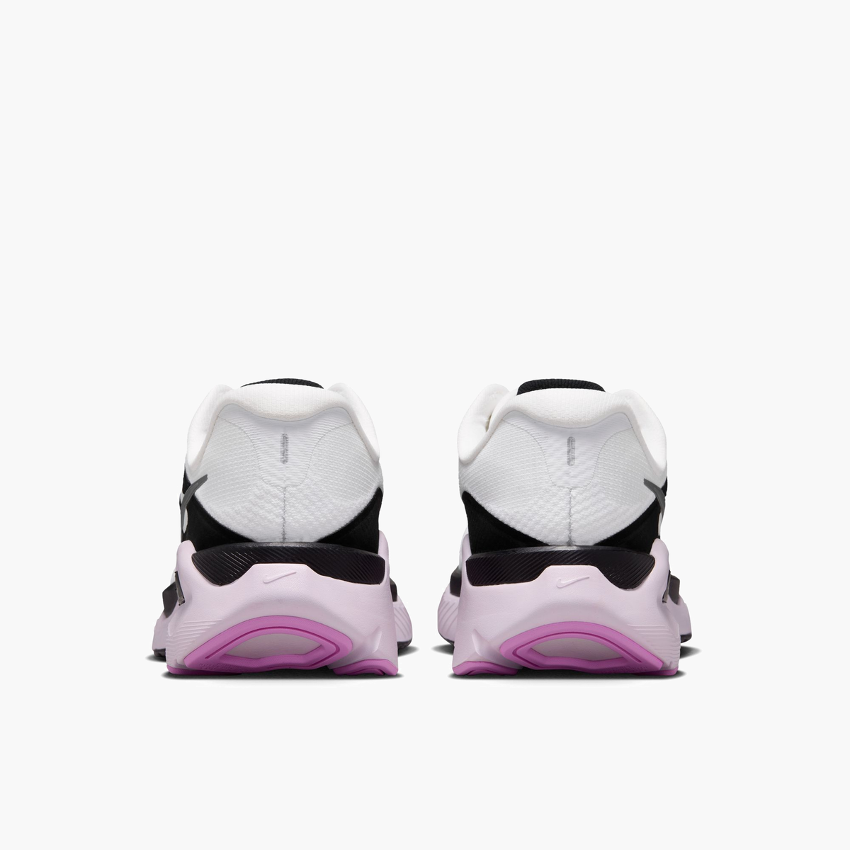 Heel angle shot of Women's Structure Plus in White / Metallic Silver-Black