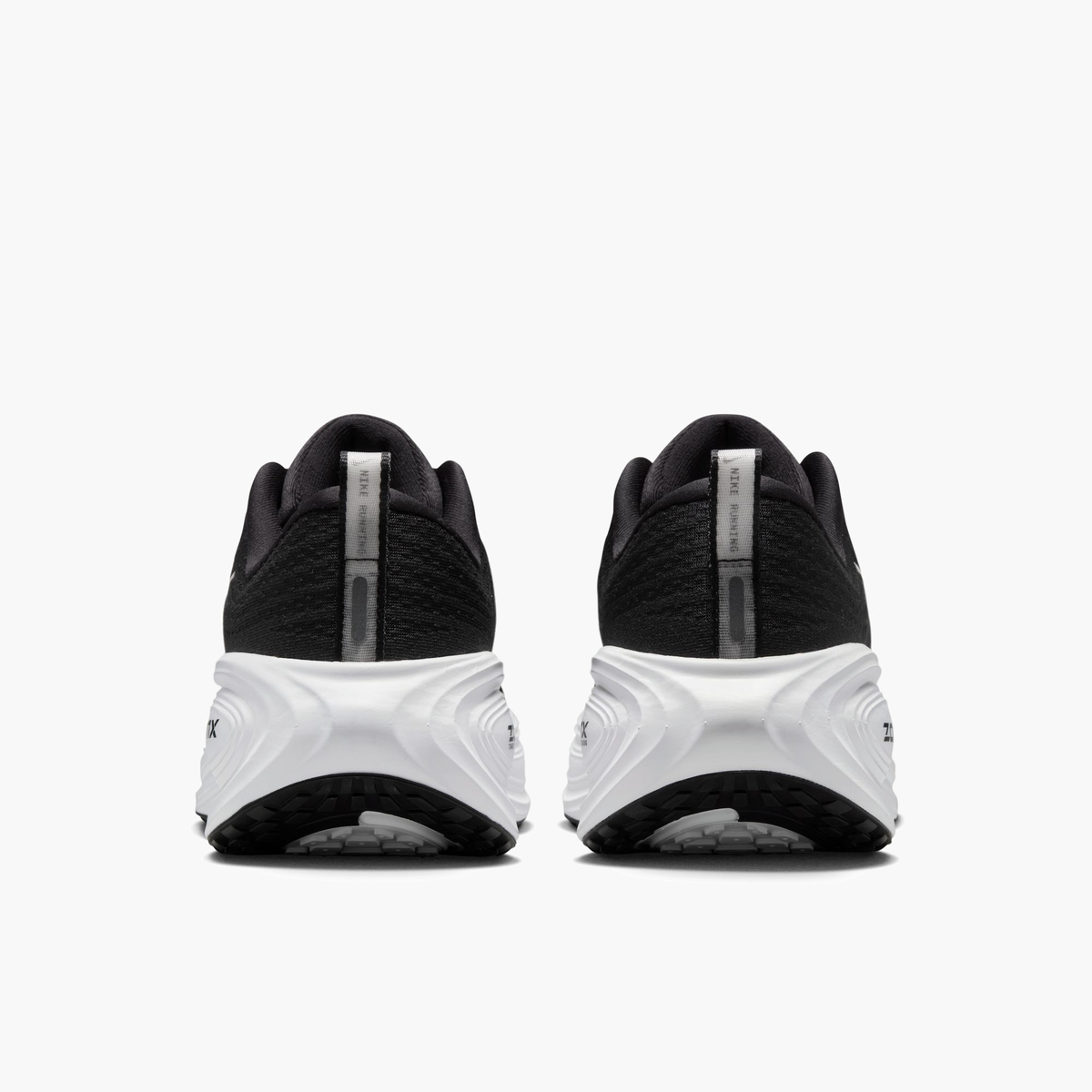 Heel angle shot of Women's Vomero Plus in Black / White-Cool Grey-Mtlc Dark Grey
