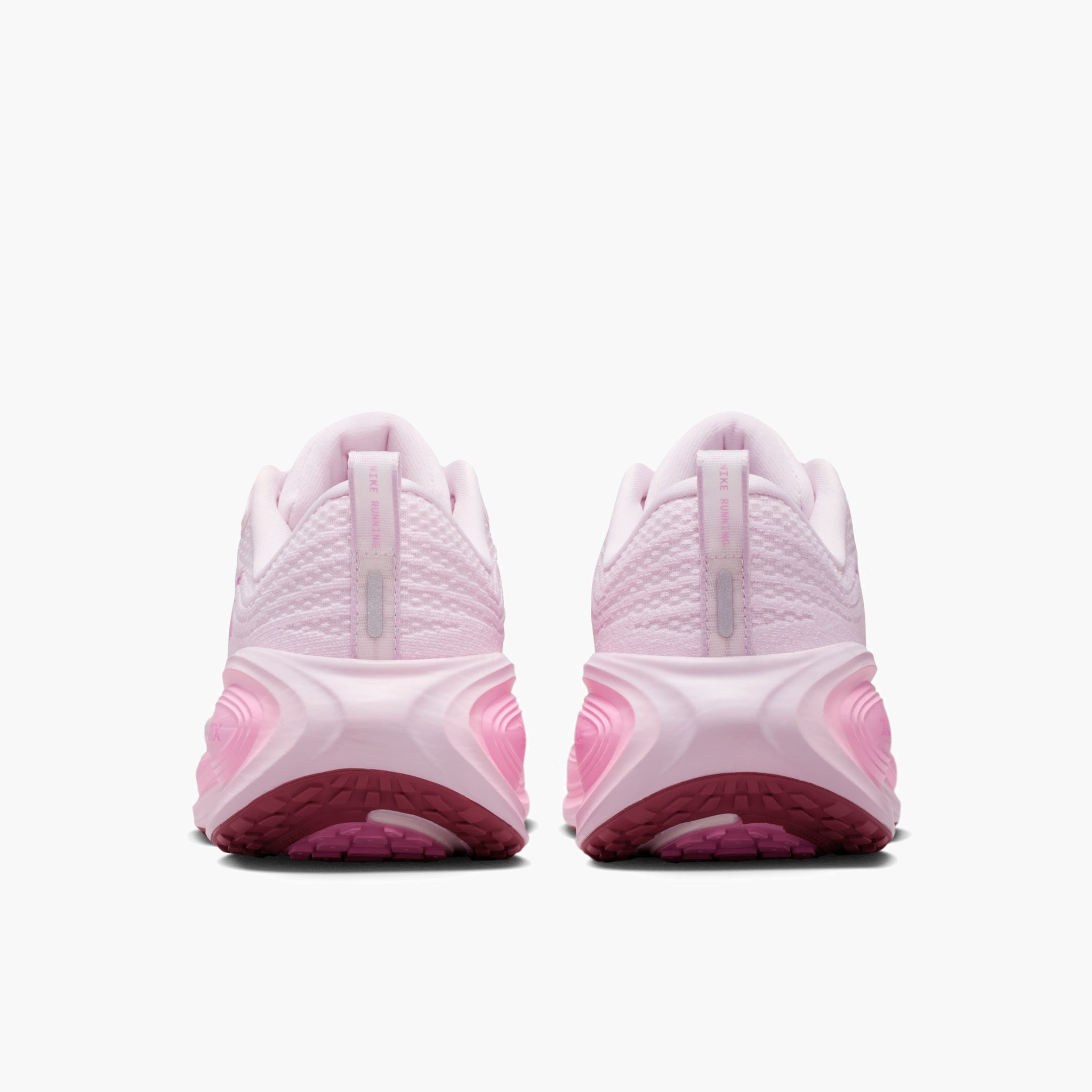 Heel angle shot of Women's Vomero Plus in Bleached Lilac / Lt Magenta-Pink Rise