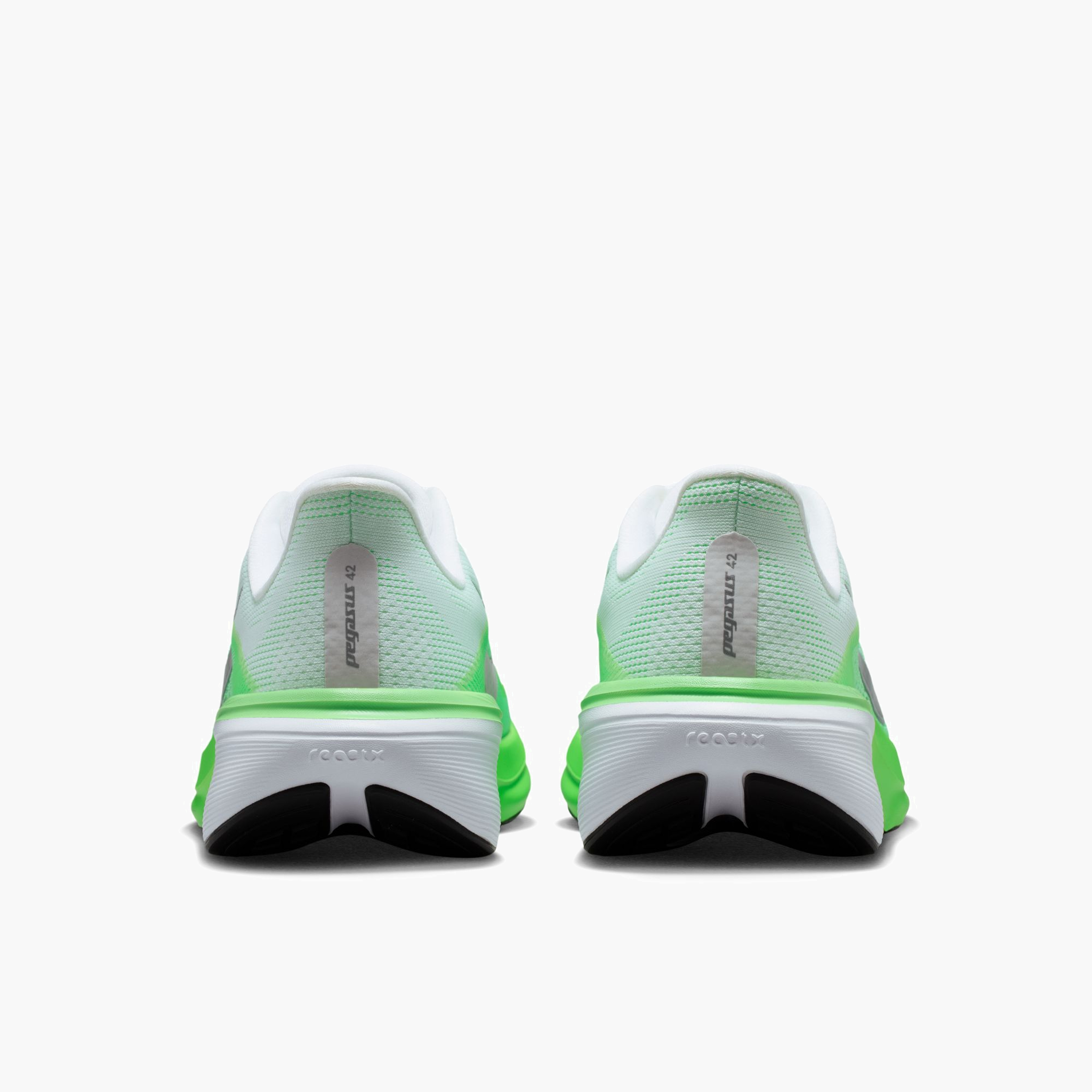 Heel angle shot of Women's Pegasus 42 in White / Metallic Silver-Green Strike