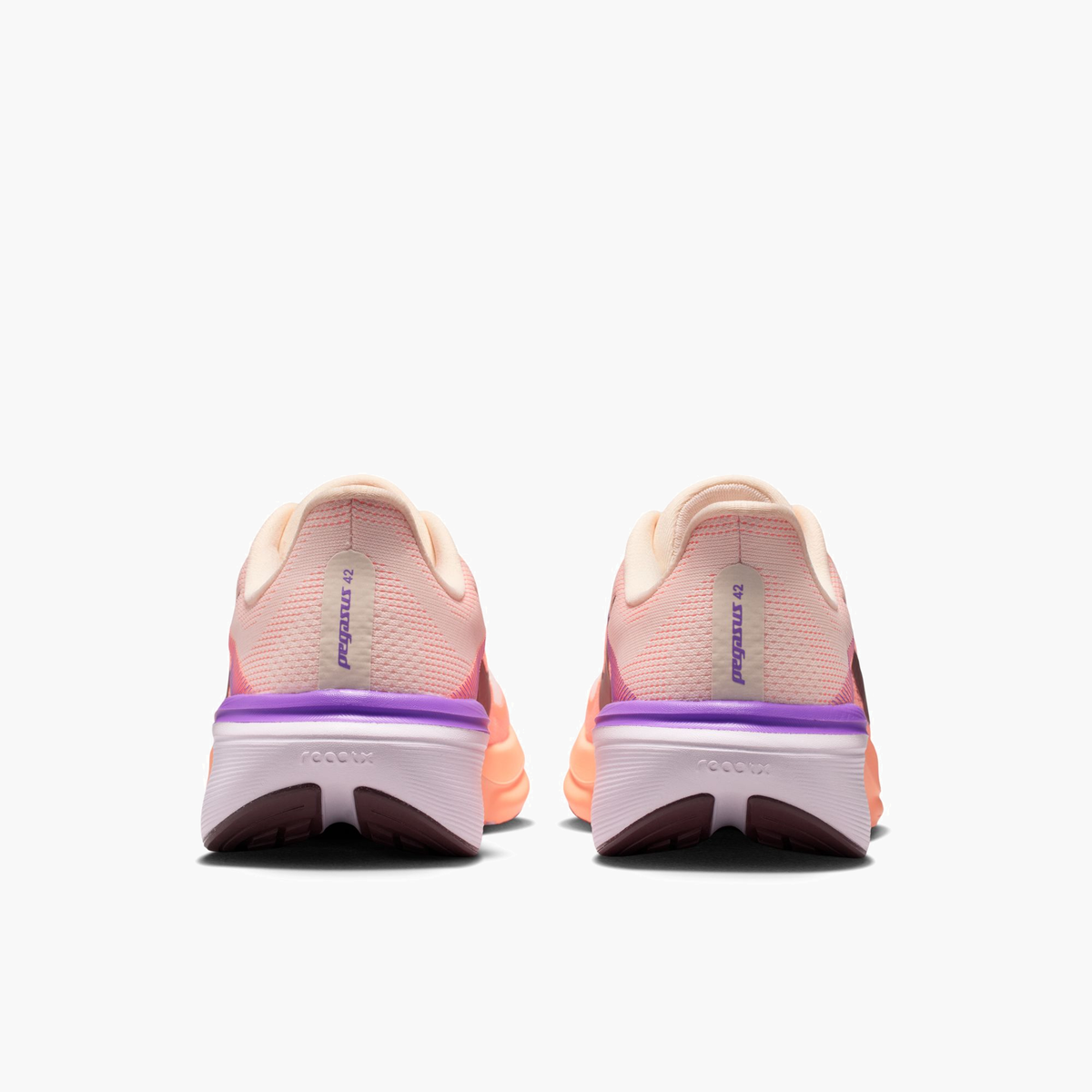 Heel angle shot of Women's Pegasus 42 in Chalk / Tattoo-Orange Pulse-Bright Violet