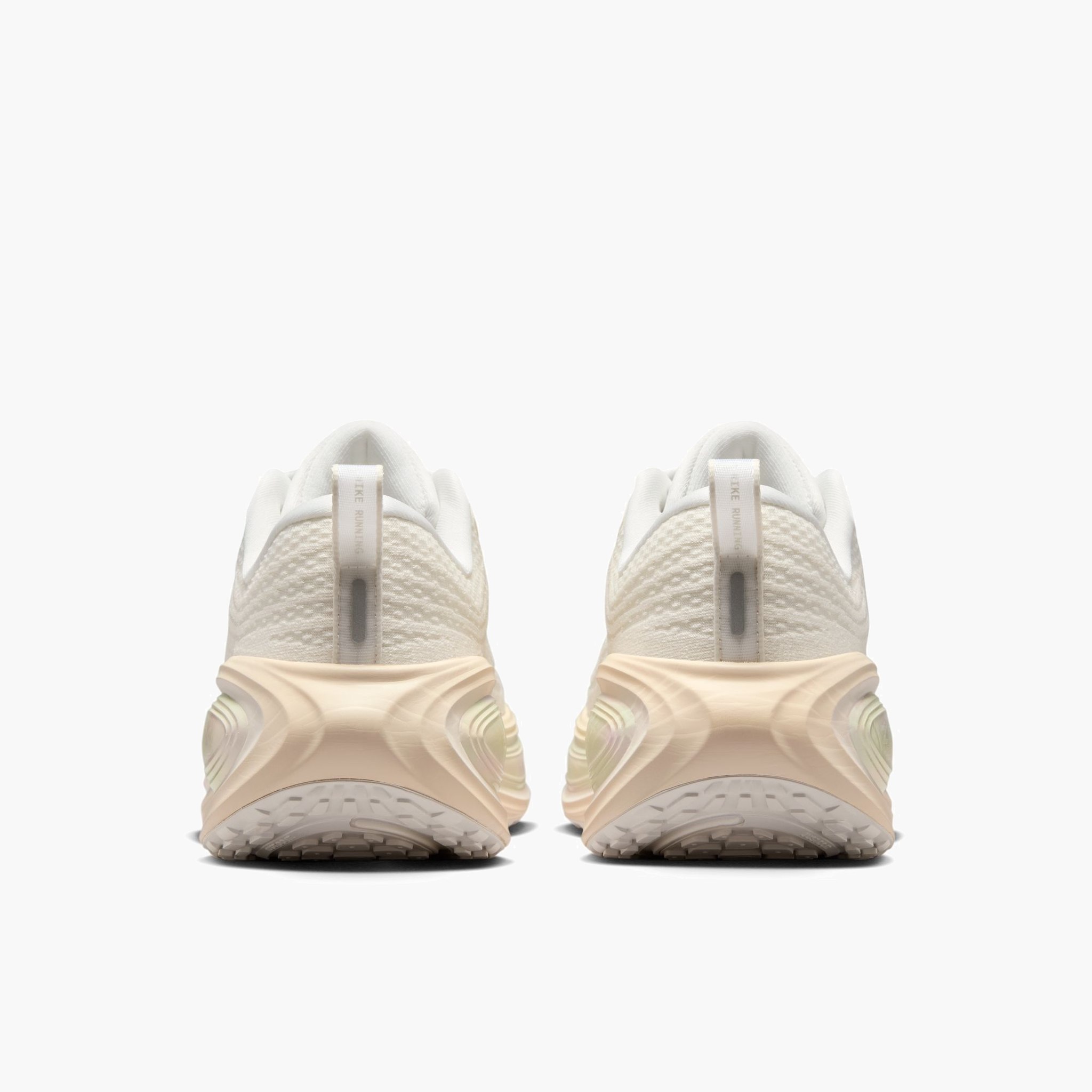 Heel angle shot of Women's Vomero Plus in Summit White / Chalk-Phantom-Pure Platinum