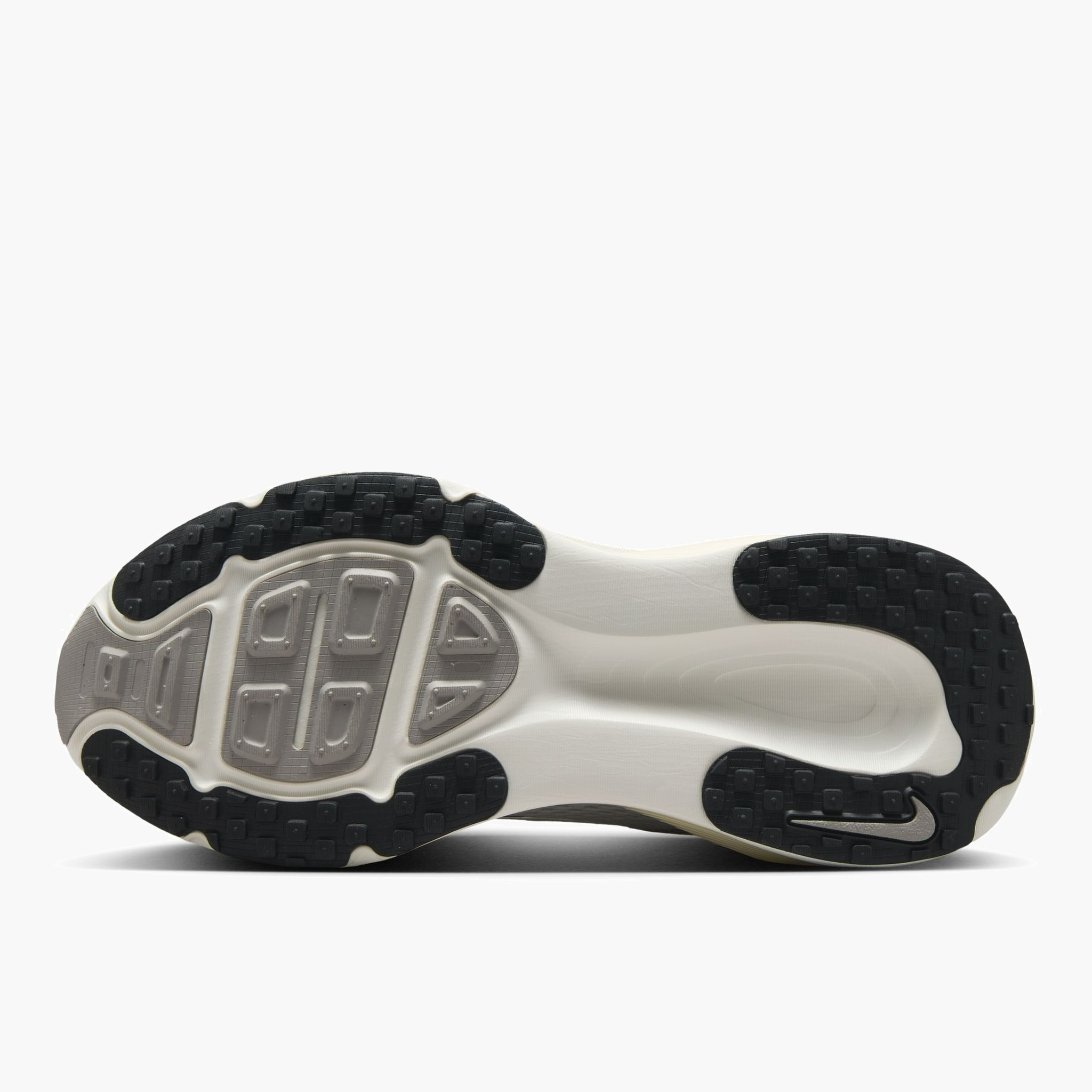 Sole angle shot of Women's Vomero 18 in Summit White / Black-Coconut Milk
