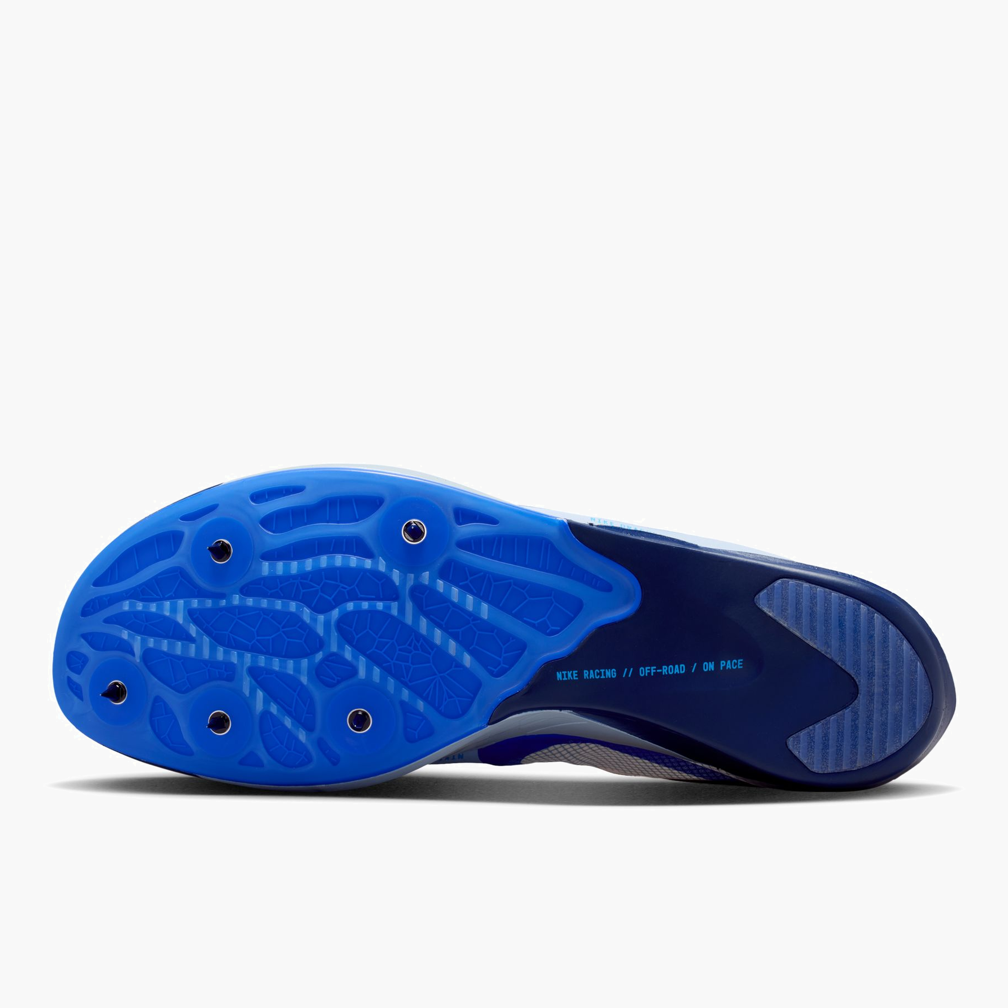 Sole angle shot of All Gender Dragonfly XC 2 in Chalk / Racer Blue-blue Void