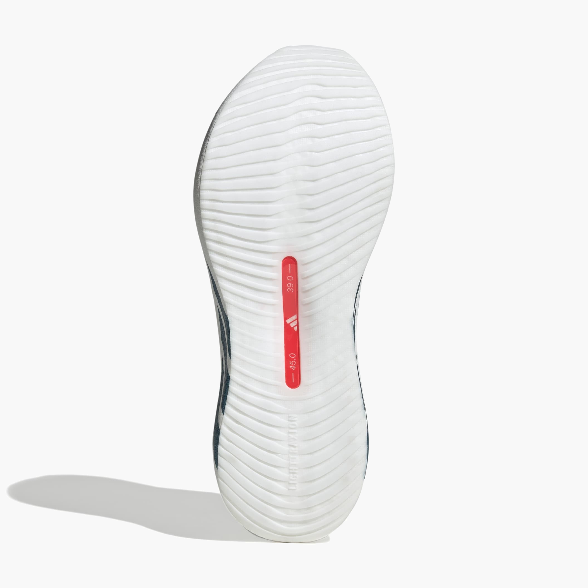 Sole angle shot of Men's Hyperboost Edge in Ftwr White / Petrol Met. / Lucid Red