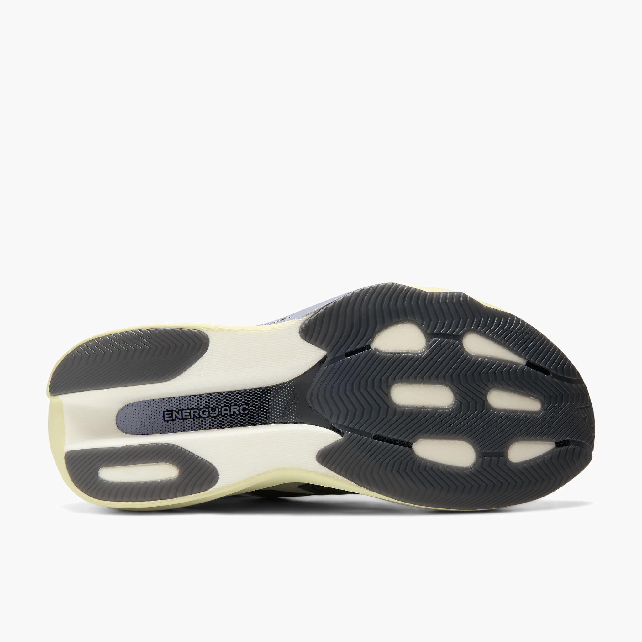 Sole angle shot of Women's Supercomp Rebel v1 in Pistachiobutter / Morel