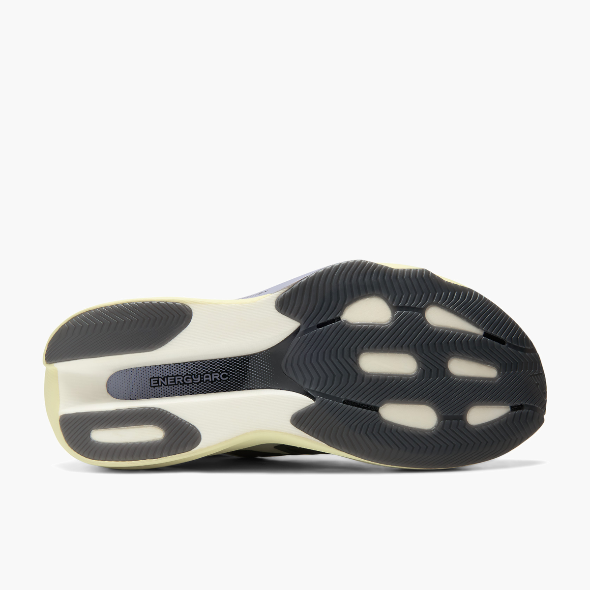 Sole angle shot of Women's Supercomp Rebel v1 in Pistachiobutter / Morel