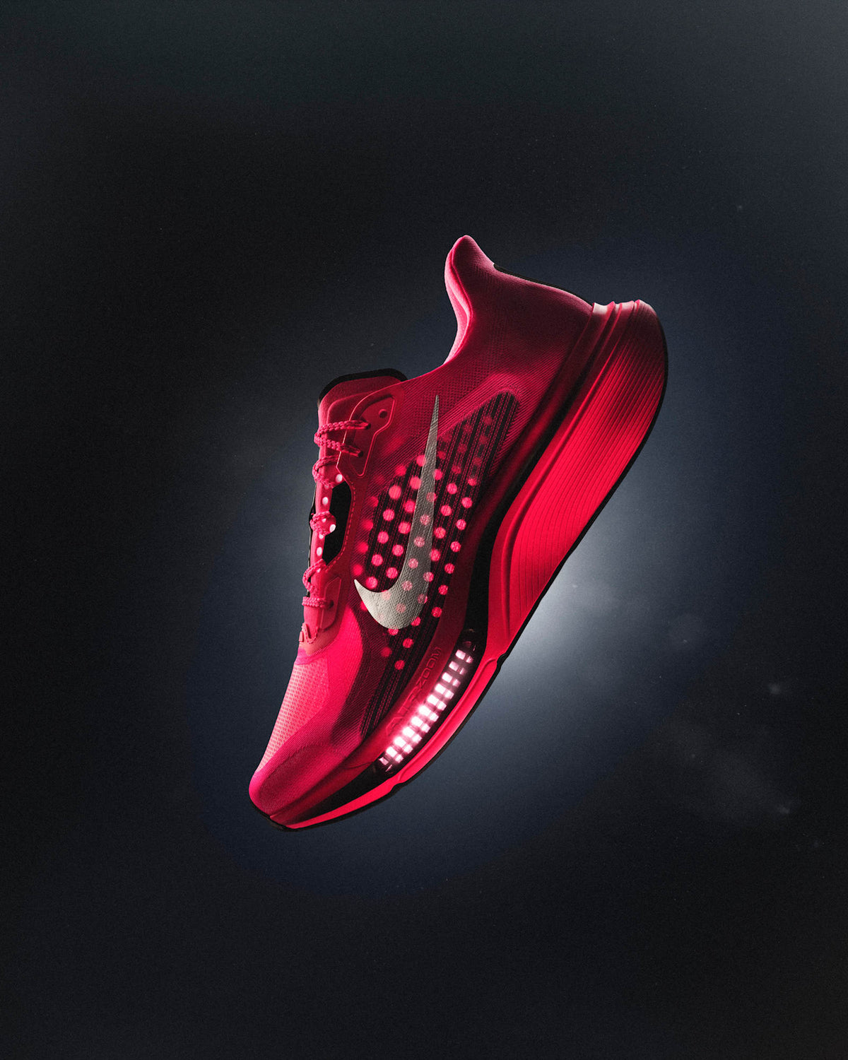 Streamlined mesh upper and midfoot containment band on the Nike Pegasus Plus 2