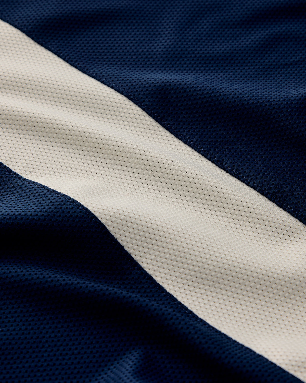 Tracksmith Van Cortlandt Tee signature sash detail